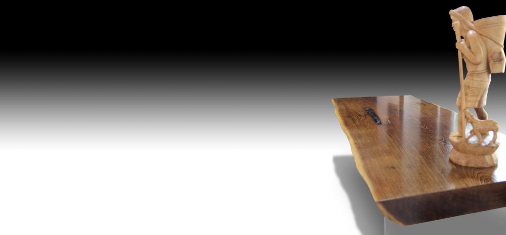 Mandarin live edge Walnut wood dining table with wooden figurine